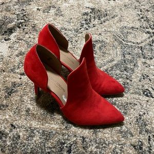 Red pointed toe heeled booties
